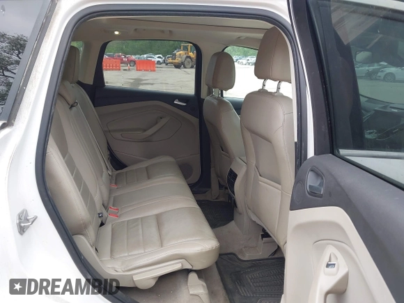 2016 Ford Escape Titanium with VIN 1FMCU9J96GUB97564, listed as a IAAI auction lot 42137663 with 269,009 mi miles. Bid and sale history available at carsss.com. Image 8.
