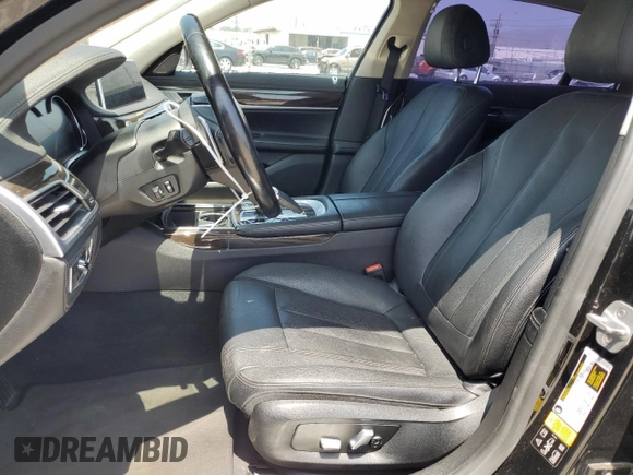 2018 BMW 7 Series 740i xDrive with VIN WBA7E4C57JGV23763, listed as a Copart auction lot 67151864 with 173,803 mi miles and Clean Title. Bid and sale history available at carsss.com. Image 7.