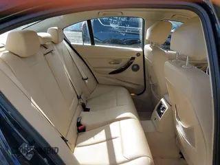 2014 BMW 3 Series 328d xDrive with VIN WBA3D5C53EKX95091, listed as a IAAI auction lot 41696613 with 117,982 mi miles. Bid and sale history available at carsss.com. Image 8.