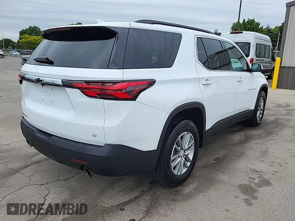 2023 Chevrolet Traverse LT z VIN 1GNEVHKW5PJ325679, wystawiony jako IAAI lot #42541394 z przebiegiem 74 480 mil mil oraz . Historia ofert i sprzedaży dostępna na DreamBid. Obrazek 2.