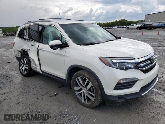 2017 Honda Pilot Touring with VIN 5FNYF6H91HB092062, listed as a Copart auction lot 52761765 with 141,750 mi miles and Salvage Title. Bid and sale history available at DreamBid. Image 4.