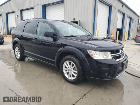 2015 Dodge Journey SXT with VIN 3C4PDDBG0FT660457, listed as a Copart auction lot 54582265 with 164,879 mi miles and Salvage title. Bid and sale history available at DreamBid. Image 4.