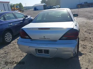 2004 Pontiac Grand Am SE with VIN 1G2NE52F74M684408, listed as a IAAI auction lot 39194361 with 169,247 mi miles. Bid and sale history available at carsss.com. Image 16.