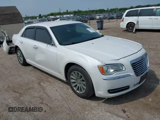 2013 Chrysler 300 with VIN 2C3CCAAGXDH515471, listed as a IAAI auction lot 42448550 with 133,208 mi miles and . Bid and sale history available at DreamBid. Image 1.