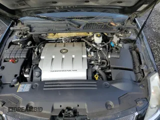 2006 Cadillac DTS 1SD z VIN 1G6KD57Y16U140102, wystawiony jako Copart lot #46145435 z przebiegiem 95 567 mil mil oraz Szkody całkowita. Historia ofert i sprzedaży dostępna na DreamBid. Obrazek 11.