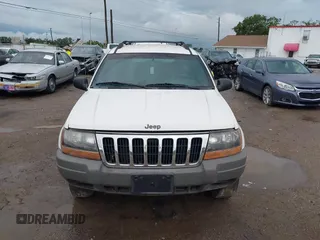 2000 Jeep Grand Cherokee Laredo z VIN 1J4G248S2YC339997, wystawiony jako IAAI lot #42395079 z przebiegiem 261 704 mil mil oraz . Historia ofert i sprzedaży dostępna na DreamBid. Obrazek 12.