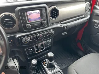 2020 Jeep Gladiator Sport S z VIN 1C6HJTAG7LL126346, wystawiony jako IAAI lot #42711702 z przebiegiem 147 263 mil mil oraz . Historia ofert i sprzedaży dostępna na DreamBid. Obrazek 6.