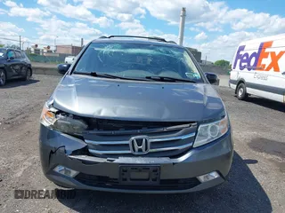 2011 Honda Odyssey Touring Elite with VIN 5FNRL5H96BB043339, listed as a IAAI auction lot 42174767 with 161,233 mi miles and . Bid and sale history available at DreamBid. Image 12.
