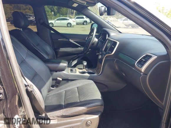 2015 Jeep Grand Cherokee Limited with VIN 1C4RJFBG8FC790575, listed as a IAAI auction lot 42124709 with 248,827 mi miles. Bid and sale history available at carsss.com. Image 5.