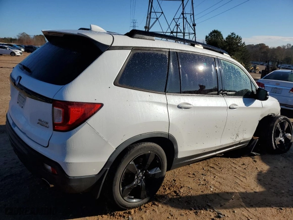 2020 Honda Passport Elite with VIN 5FNYF8H0XLB011159, listed as a Copart auction lot 81048334 with 54,484 mi miles and Salvage Title. Bid and sale history available at carsss.com. Image 3.
