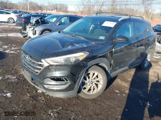 2016 Hyundai Tucson SE with VIN KM8J3CA42GU076476, listed as a IAAI auction lot 41272580 with 112,010 mi miles. Bid and sale history available at carsss.com. Image 2.