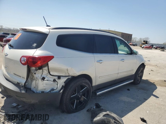 2012 Chevrolet Traverse LTZ z VIN 1GNKVLED1CJ170106, wystawiony jako Copart lot #52022235 z przebiegiem Nie podano mil oraz Szkoda całkowita • Salvage title. Historia ofert i sprzedaży dostępna na DreamBid. Obrazek 3.
