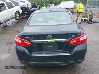 2016 Nissan Altima SR with VIN 1N4AL3AP0GC284799, listed as a IAAI auction lot 42476891 with 158,321 mi miles and . Bid and sale history available at DreamBid. Image 16.