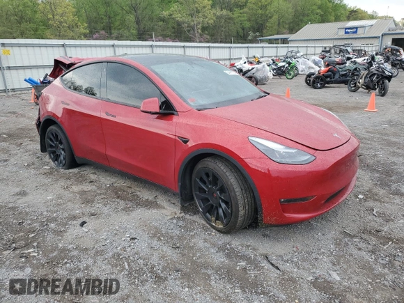 2023 Tesla Model Y Long Range z VIN 7SAYGAEE1PF690008, wystawiony jako Copart lot #54441735 z przebiegiem 38 291 mil mil oraz Szkody całkowita. Historia ofert i sprzedaży dostępna na DreamBid. Obrazek 4.