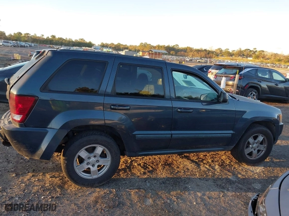 2007 Jeep Grand Cherokee Laredo with VIN 1J8GS48K17C655999, listed as a IAAI auction lot 41590500 with 290,695 mi miles. Bid and sale history available at carsss.com. Image 13.