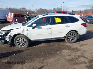2017 Subaru Outback Touring with VIN 4S4BSETC8H3403963, listed as a IAAI auction lot 41649804 with 71,594 mi miles and . Bid and sale history available at DreamBid. Image 14.