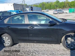 2020 Kia Rio LX with VIN 3KPA24AD6LE309894, listed as a IAAI auction lot 42019106 with 64,851 mi miles and . Bid and sale history available at DreamBid. Image 13.