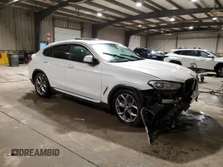 2022 BMW X4 xDrive30i with VIN 5UX33DT05N9J34723, listed as a Copart auction lot 85291284 with 22,894 mi miles and Clean Title. Bid and sale history available at carsss.com. Image 4.