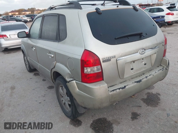 2007 Hyundai Tucson SE with VIN KM8JN12D77U539841, listed as a IAAI auction lot 41777599 with 126,958 mi miles. Bid and sale history available at carsss.com. Image 3.