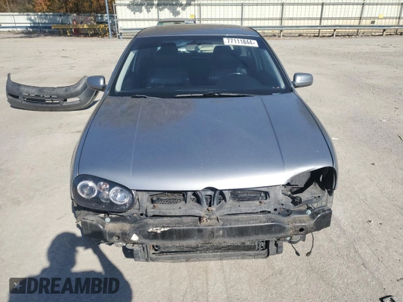 2004 Volkswagen GTI 1.8T z VIN 9BWDE61J644001221, wystawiony jako Copart lot #77111844 z przebiegiem 187 975 mil mil oraz Szkoda całkowita • Salvage title. Historia ofert i sprzedaży dostępna na DreamBid. Obrazek 5.
