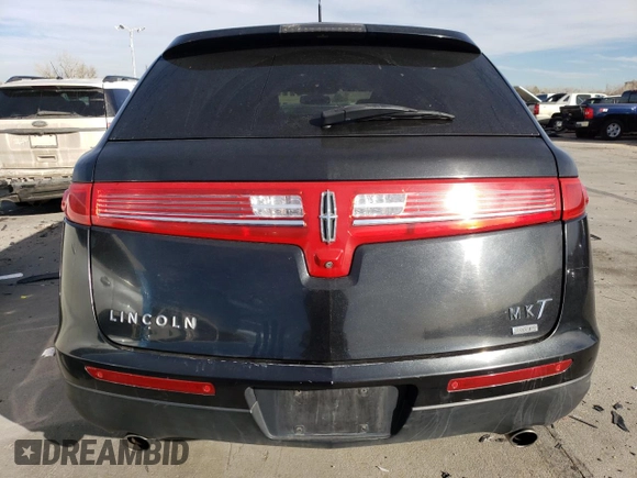 2015 Lincoln MKT with VIN 2LMHJ5NK0FBL03357, listed as a Copart auction lot 87189024 with 228,046 mi miles and Salvage Title. Bid and sale history available at carsss.com. Image 6.