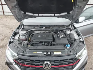 2021 Volkswagen Jetta GLI S with VIN 3VW6T7BU2MM021376, listed as a IAAI auction lot 41448938 with 59,016 mi miles and . Bid and sale history available at DreamBid. Image 10.