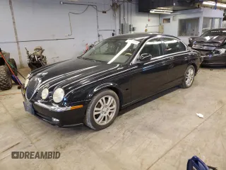 2003 Jaguar S-Type with VIN SAJEA01U93HM84195, listed as a Copart auction lot 54300574 with 98,820 mi miles and Clean Title. Bid and sale history available at DreamBid. Image 1.