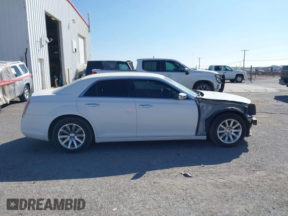 2014 Chrysler 300 with VIN 2C3CCAEG4EH312930, listed as a IAAI auction lot 41907509 with 128,940 mi miles. Bid and sale history available at carsss.com. Image 13.