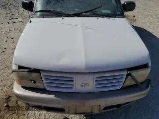 2000 Oldsmobile Bravada z VIN 1GHDT13W8Y2333619, wystawiony jako Copart lot #49631575 z przebiegiem 256 252 mil mil oraz Szkoda całkowita • Salvage title. Historia ofert i sprzedaży dostępna na DreamBid. Obrazek 14.