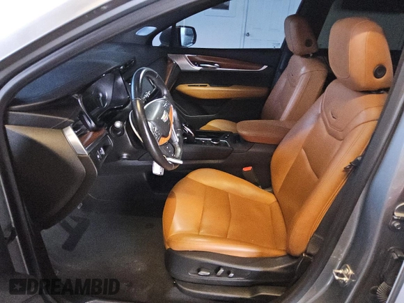 2023 Cadillac XT5 AWD Premium Luxury with VIN 1GYKNDR49PZ222592, listed as a Copart auction lot 79759624 with 32,177 mi miles and Clean Title. Bid and sale history available at DreamBid. Image 7.