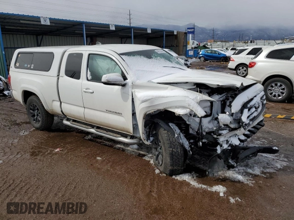 2021 Toyota Tacoma SR z VIN 3TYSZ5AN0MT009231, wystawiony jako Copart lot #49252665 z przebiegiem Nie podano mil oraz Szkoda całkowita • Salvage title. Historia ofert i sprzedaży dostępna na DreamBid. Obrazek 4.