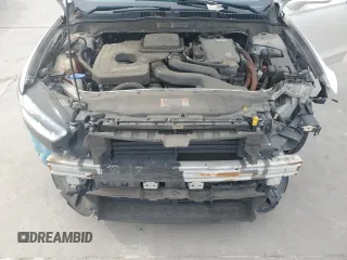 2013 Ford Fusion Titanium Hybrid с VIN 3FA6P0RU3DR282013, выставлен на аукционе Copart как лот 53651595 с пробегом 133 214 миль миль и Списание • Salvage title. История ставок и продаж доступна на DreamBid. Изображение 11.