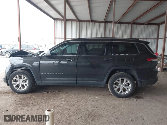 2023 Jeep Grand Cherokee Limited with VIN 1C4RJKBG0P8810475, listed as a IAAI auction lot 41615533 with 28,671 mi miles and . Bid and sale history available at DreamBid. Image 14.