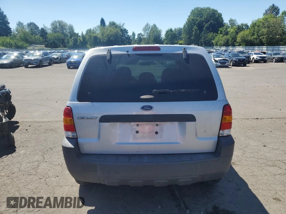 2005 Ford Escape XLS Value with VIN 1FMYU92Z55KC93604, listed as a Copart auction lot 60104145 with 86,788 mi miles and Salvage title. Bid and sale history available at DreamBid. Image 6.