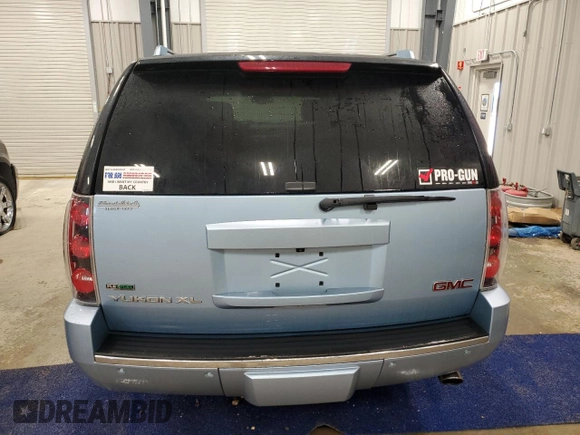 2011 GMC Yukon XL Denali z VIN 1GKS2MEF5BR254295, wystawiony jako Copart lot #49889805 z przebiegiem 79 258 mil mil oraz Tytuł czysty. Historia ofert i sprzedaży dostępna na DreamBid. Obrazek 6.