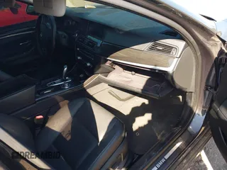 2012 BMW 5 Series 528i xDrive with VIN WBAXH5C5XCDW02071, listed as a IAAI auction lot 41831852 with 999,999 mi miles. Bid and sale history available at carsss.com. Image 5.