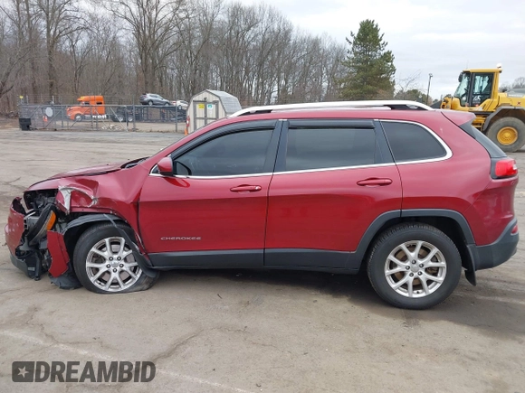 2015 Jeep Cherokee Latitude with VIN 1C4PJMCS6FW594812, listed as a IAAI auction lot 41709068 with 125,232 mi miles. Bid and sale history available at carsss.com. Image 14.
