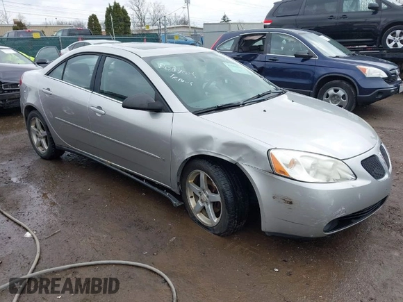 2006 Pontiac G6 6-Cyl with VIN 1G2ZG558464289212, listed as a IAAI auction lot 41994843 with 126,502 mi miles. Bid and sale history available at carsss.com. Image 1.