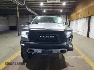 2022 Ram 1500 Rebel z VIN 1C6SRFLT1NN258780, wystawiony jako Copart lot #53040405 z przebiegiem 27 307 mil mil oraz Szkoda całkowita • Salvage title. Historia ofert i sprzedaży dostępna na DreamBid. Obrazek 5.