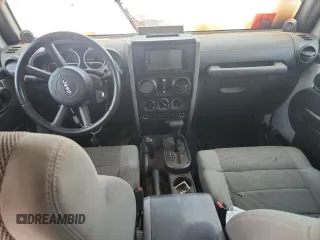 2007 Jeep Wrangler Unlimited Sahara с VIN 1J4GA59167L183198, выставлен на аукционе Copart как лот 62135995 с пробегом Не указан миль и Списание • Salvage title. История ставок и продаж доступна на DreamBid. Изображение 8.