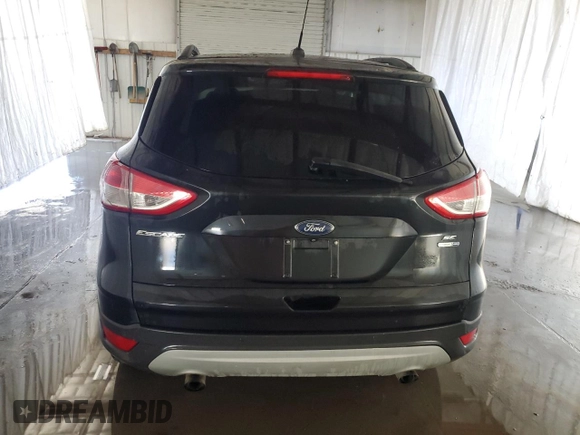 2015 Ford Escape SE with VIN 1FMCU9G99FUB64824, listed as a Copart auction lot 54930305 with 143,388 mi miles and Clean Title. Bid and sale history available at DreamBid. Image 6.