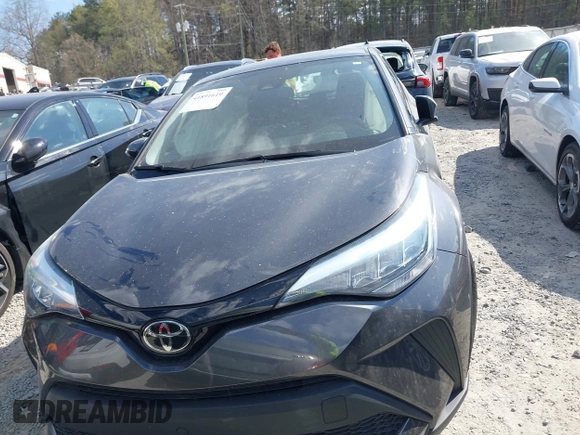 2021 Toyota C-HR LE with VIN NMTKHMBX3MR128835, listed as a IAAI auction lot 41891619 with 57,744 mi miles and . Bid and sale history available at DreamBid. Image 12.