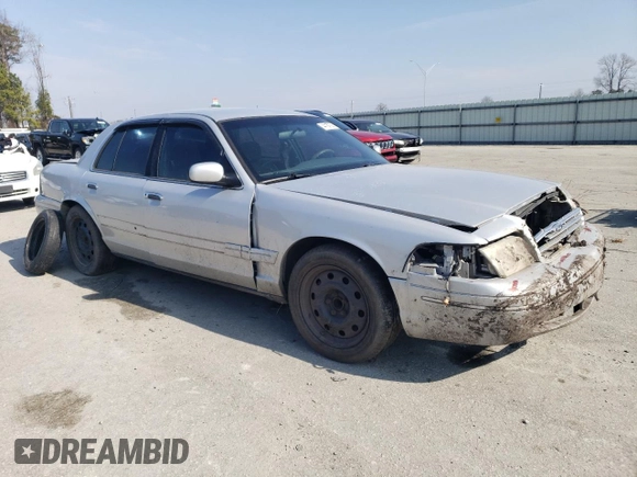 2003 Ford Police Interceptor Street Appear with VIN 2FAFP71WX3X110275, listed as a Copart auction lot 44157665 with 275,661 mi miles and Salvage title. Bid and sale history available at DreamBid. Image 4.