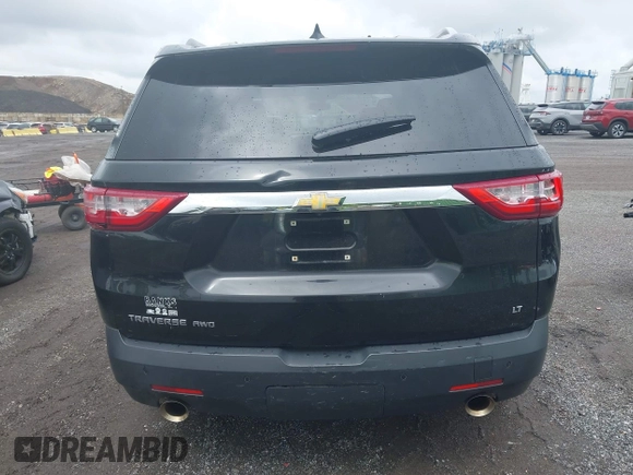 2018 Chevrolet Traverse LT Cloth z VIN 1GNEVGKWXJJ213302, wystawiony jako IAAI lot #42298743 z przebiegiem 138 282 mil mil oraz . Historia ofert i sprzedaży dostępna na DreamBid. Obrazek 16.