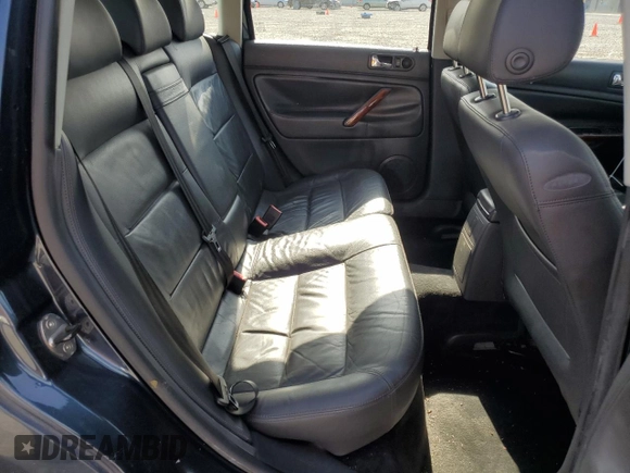 2005 Volkswagen Passat GLS z VIN WVWCE63B95E042241, wystawiony jako Copart lot #60874005 z przebiegiem 197 761 mil mil oraz Szkoda całkowita • Salvage title. Historia ofert i sprzedaży dostępna na DreamBid. Obrazek 11.