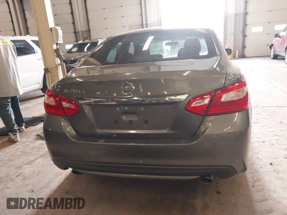 2016 Nissan Altima S z VIN 1N4AL3AP5GN343706, wystawiony jako IAAI lot #42001606 z przebiegiem 66 020 mil mil oraz . Historia ofert i sprzedaży dostępna na DreamBid. Obrazek 16.