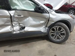 2020 Ford Escape SEL z VIN 1FMCU9H65LUA49816, wystawiony jako IAAI lot #42671041 z przebiegiem 32 541 mil mil oraz . Historia ofert i sprzedaży dostępna na DreamBid. Obrazek 6.
