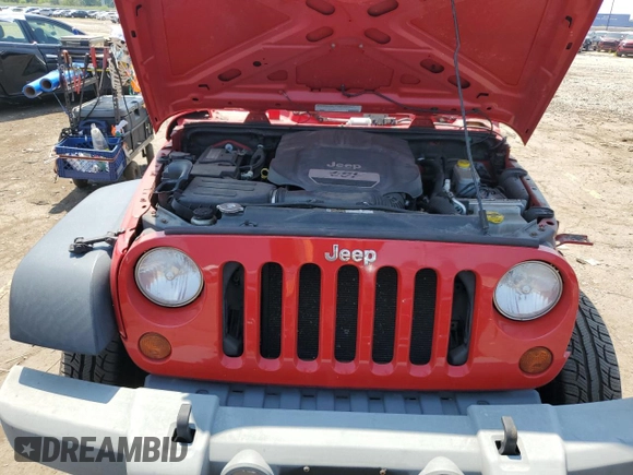 2012 Jeep Wrangler Sport z VIN 1C4AJWAG6CL216888, wystawiony jako Copart lot #65686715 z przebiegiem 72 404 mil mil oraz Czysty tytuł • Clean title. Historia ofert i sprzedaży dostępna na DreamBid. Obrazek 11.