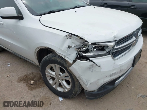 2013 Dodge Durango SXT z VIN 1C4RDHAG4DC598250, wystawiony jako IAAI lot #42076002 z przebiegiem 104 701 mil mil oraz . Historia ofert i sprzedaży dostępna na DreamBid. Obrazek 6.