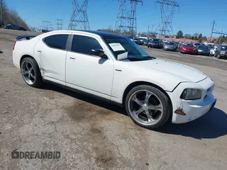 2010 Dodge Charger Police z VIN 2B3AA4CV0AH183575, wystawiony jako IAAI lot #41857879 z przebiegiem 184 933 mil mil oraz . Historia ofert i sprzedaży dostępna na DreamBid. Obrazek 1.